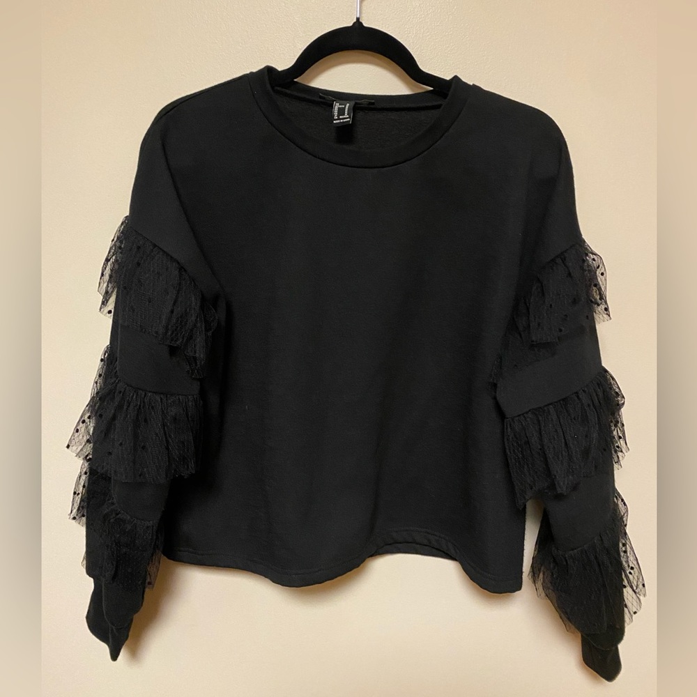 Forever 21 black cropped crew neck with light decor on the sleeves